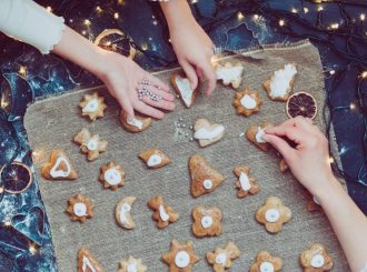 mom-with-daughter-decorating-christmas-cookies-2023-11-27-05-20-10-utc (1)